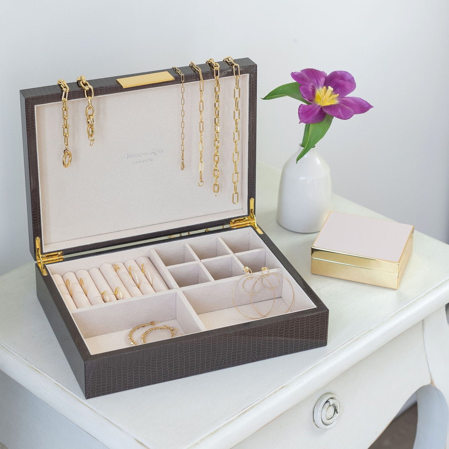 Large brown jewelry box with suede interior