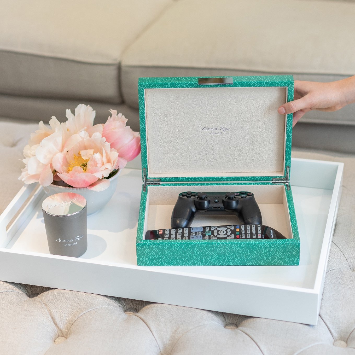 Large green storage box with cream suede interior