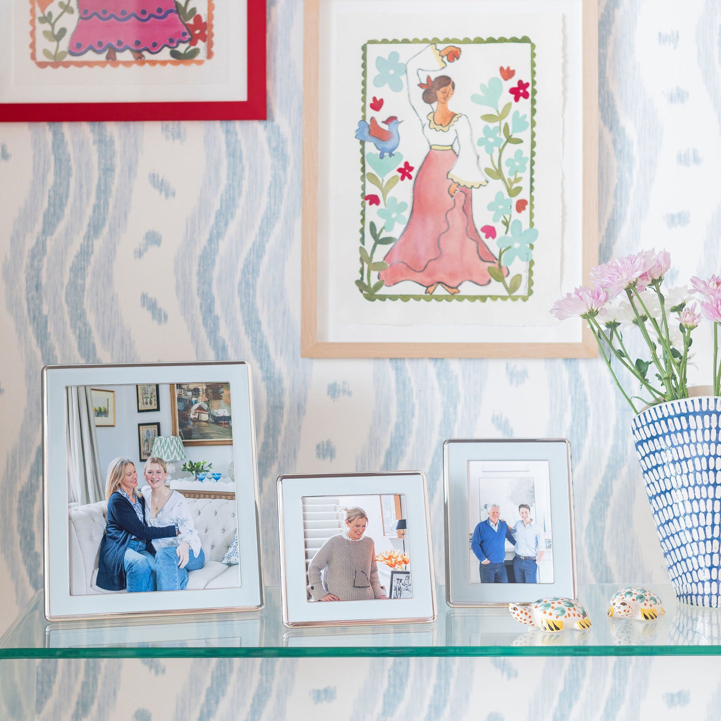 Three curved silver trim powder blue enamel photo frames